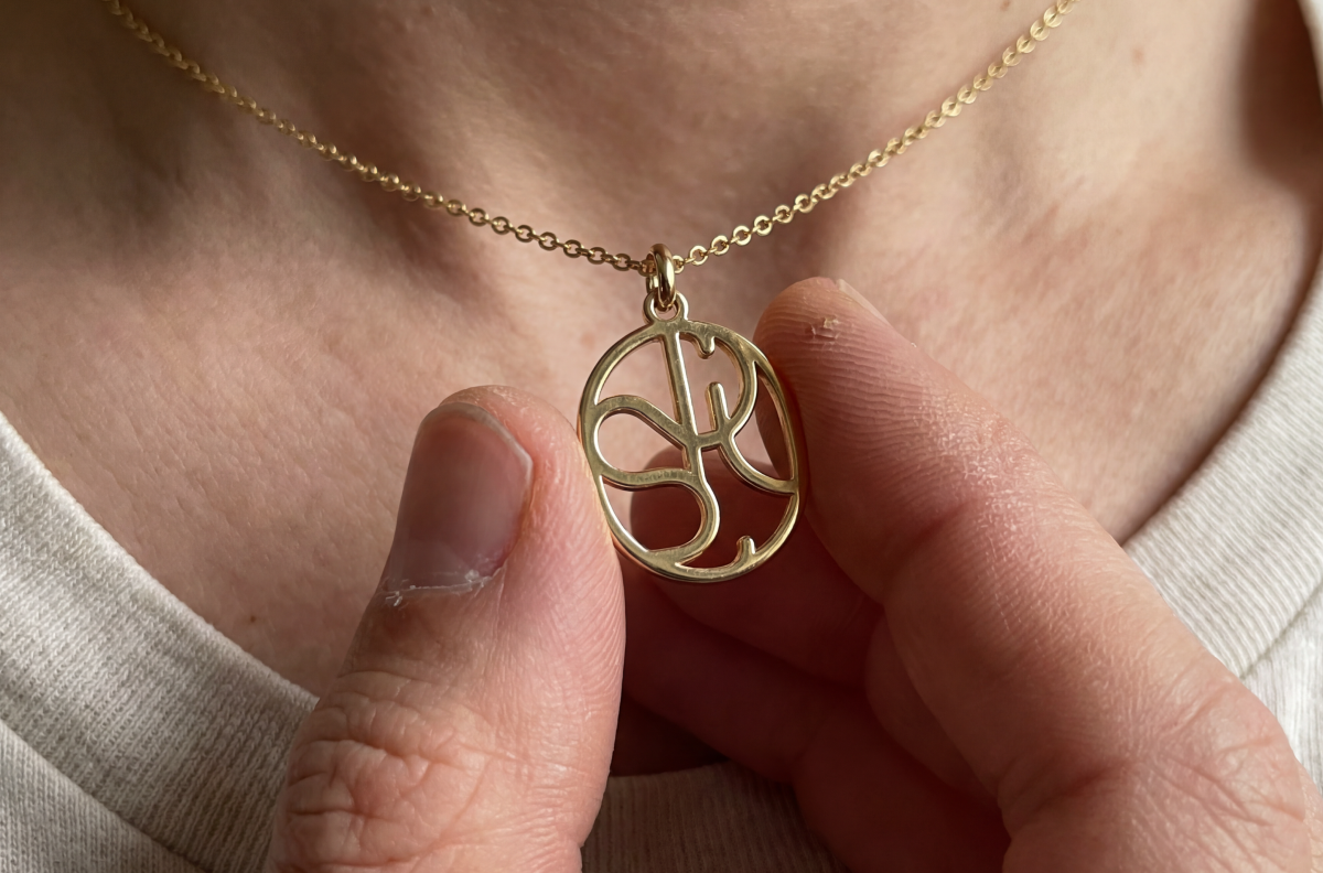 A Charmlry memorial piece, worn