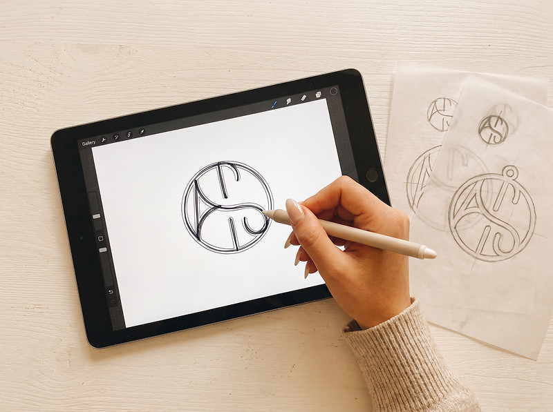 A designer draws it